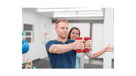 photo of man lifting weights